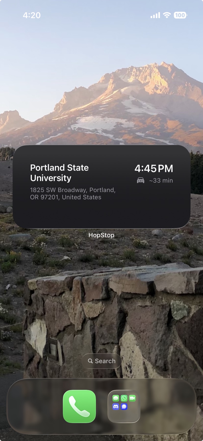 The medium Next Stop widget on an iPhone home screen, showing the next stop's name, address, start time, and drive time